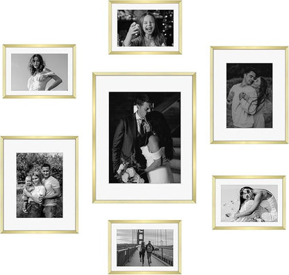 Frametory, Gold Aluminum Picture Frame with Removable Mat - Set of 7 Includes Four 5x7, Two 8x10, One 11x14 - Real Glass Front - Simple Gallery Wall Frames for Art Prints and Posters