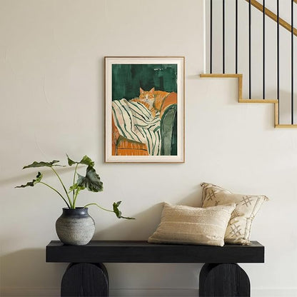 ASTRDECOR Minimalist Framed Wall Art - Cozy Cat Sleeping on Couch with Vintage Green & White Striped Blanket, Trendy Cute Orange Cat Canvas Posters, Modern Aesthetic Bedroom Apartment or Living Room Décor 12x16Inch