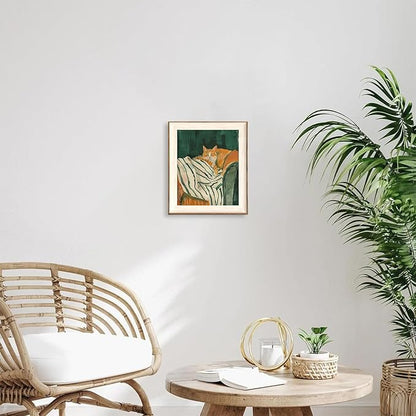ASTRDECOR Minimalist Framed Wall Art - Cozy Cat Sleeping on Couch with Vintage Green & White Striped Blanket, Trendy Cute Orange Cat Canvas Posters, Modern Aesthetic Bedroom Apartment or Living Room Décor 10x12Inch