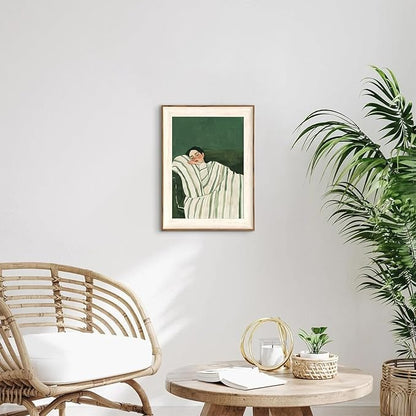 ASTRDECOR Minimalist Framed Wall Art - Cozy Woman Sleeping on Couch, Emerald Green & White Striped Blanket, Modern Aesthetic Bedroom or Living Room Décor, Eclectic Canvas Art Prints for Apartment 12x16Inch