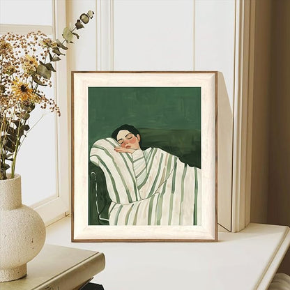 ASTRDECOR Minimalist Framed Wall Art - Cozy Woman Sleeping on Couch, Emerald Green & White Striped Blanket, Modern Aesthetic Bedroom or Living Room Décor, Eclectic Canvas Art Prints for Apartment 10x12Inch