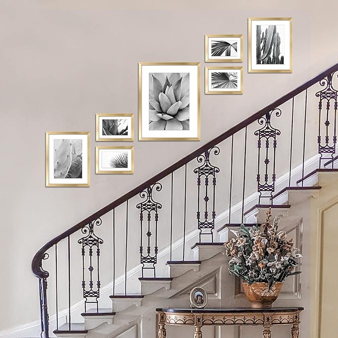 ArtbyHannah 7 Pack Gold Gallery Wall Picture Frames Sets with Decorative Botanical Art Prints for Photo Frame Collages for Home Decoration, Multiple Sizes 11x14x1, 8x10x2, 5x7x4