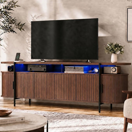 69" Mid Century Modern TV Stand, Curved Entertainment Center with LED Light & Power Outlet, Fluted Wood TV Stand for TVs up to 80'',Media TV Console Table with Sliding Doors for Living Room, Walnut