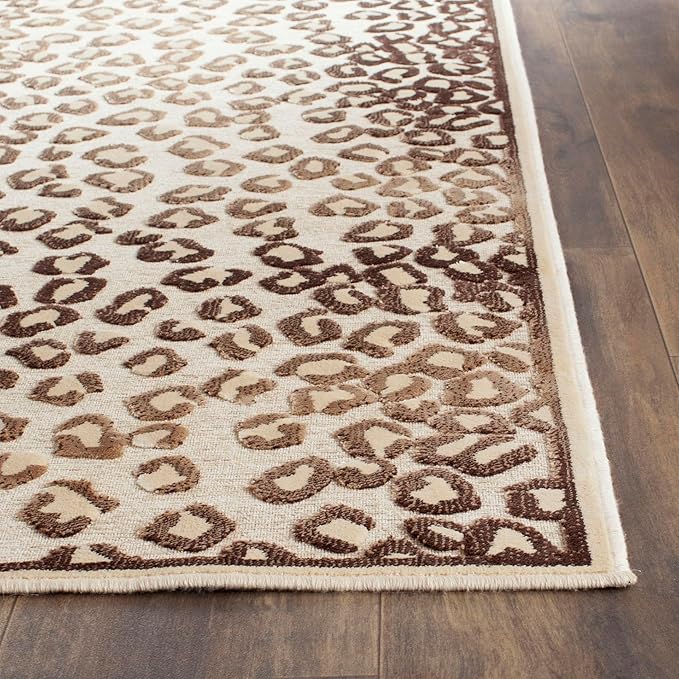 SAFAVIEH Paradise Collection Area Rug - 5'3" x 7'6", Creme, Animal Print Viscose Design, Ideal for High Traffic Areas in Living Room, Bedroom (PAR84-404)
