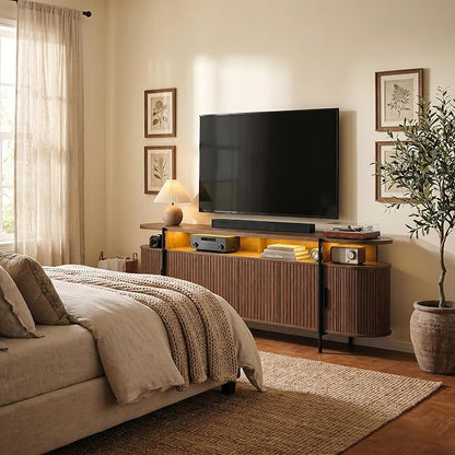 69" Mid Century Modern TV Stand, Curved Entertainment Center with LED Light & Power Outlet, Fluted Wood TV Stand for TVs up to 80'',Media TV Console Table with Sliding Doors for Living Room, Walnut